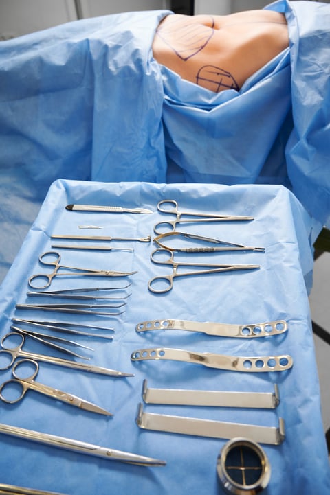 Surgical dissector instruments on medical table in operating room