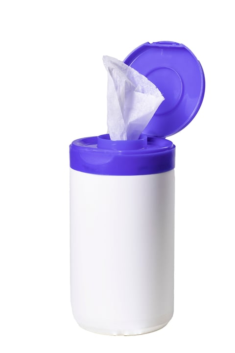 White wipes soaked in disinfectant for household surface decontamination