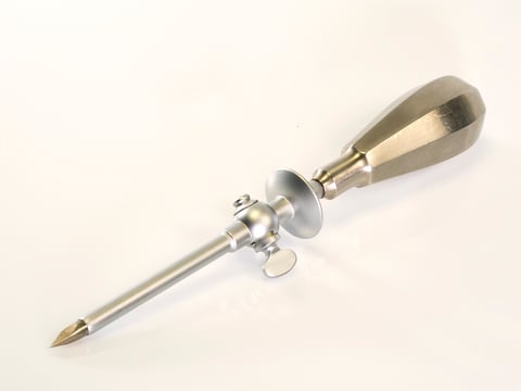 surgical tool in stainless steel white background