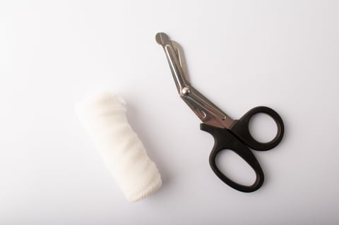 Surgical scissors on white background