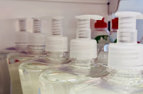 Rows Of Clear Hand Sanitizer Bottles On Pharmacy Shelf