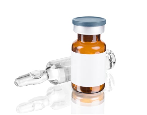 Medical ampoules on white