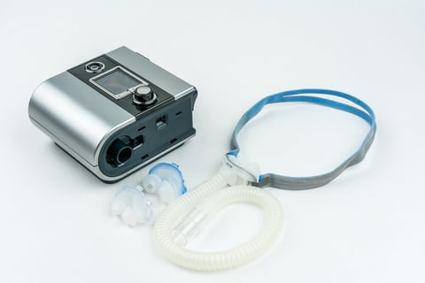 CPAP machine with hose and mask for nose - medical equipment battery