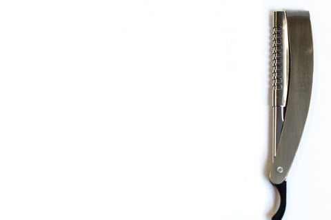 Surgical scissors and instruments on white background