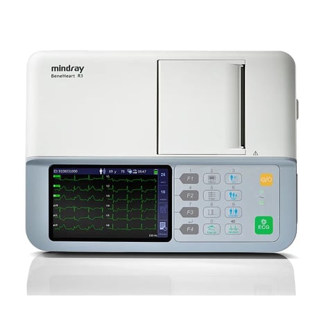 Mindray portable ECG monitor displaying multi-channel heart rhythm waveforms on screen with control panel buttons