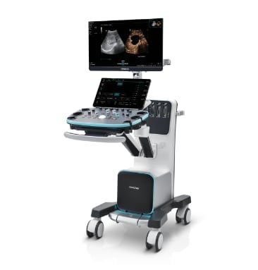 Medical ultrasound machine on wheeled cart with monitor displaying ultrasound images and control panel with blue touchscreen