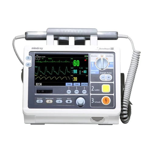 Mindray BeneHeart defibrillator with display screen showing heart rhythm waveforms and vital signs readings
