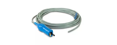 Coiled gray USB cable with blue connector and housing isolated on white background