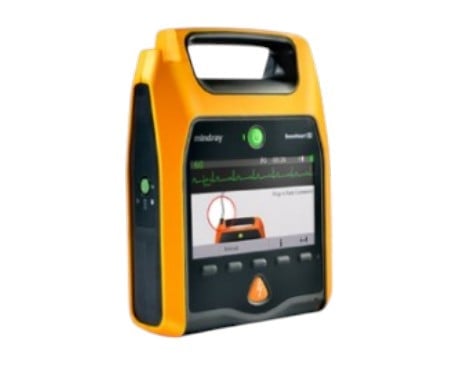 Portable defibrillator with yellow and black casing, display screen, and control buttons