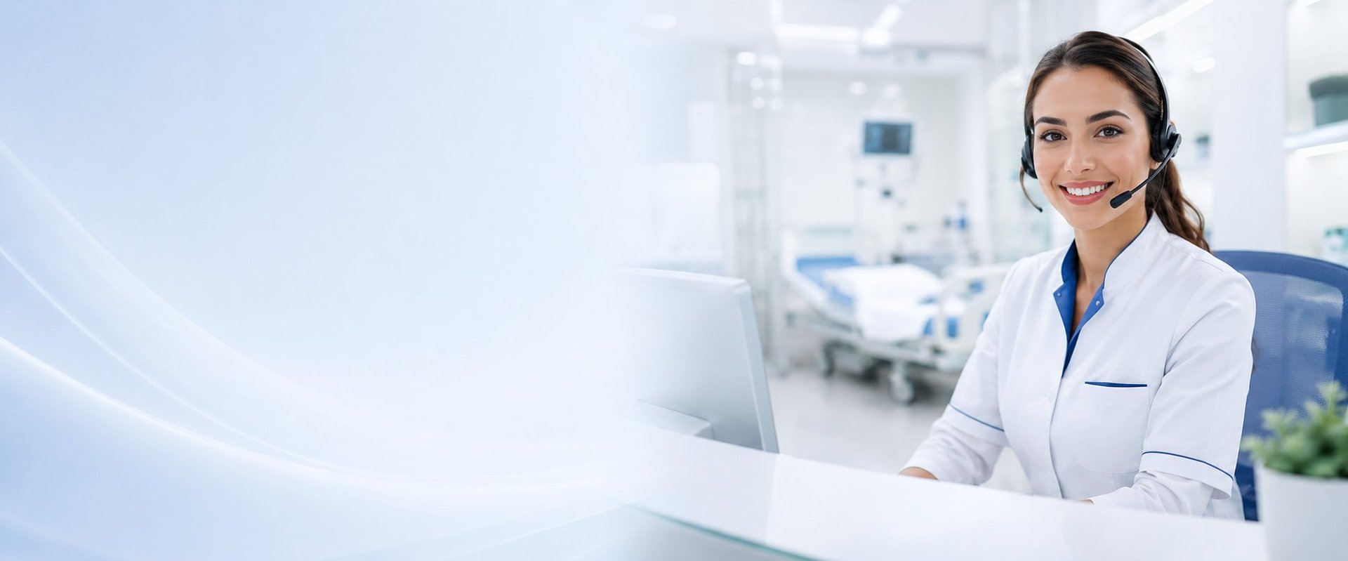 Female healthcare professional smiling at desk in modern medical clinic with hospital room in background