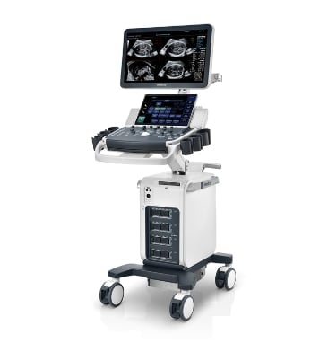 Medical ultrasound machine on wheeled cart with display monitor and keyboard