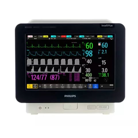 Philips IntelliVue patient monitor displaying vital signs including heart rate, blood pressure, oxygen saturation, and ECG waveforms