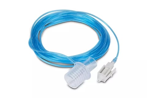 Blue medical-grade tubing with transparent connectors on both ends, coiled on white background
