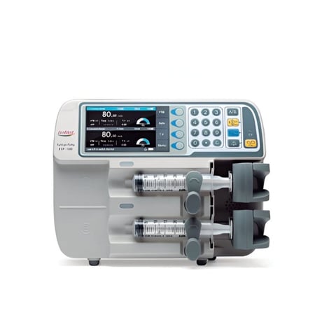 Alaris infusion pump medical device with dual channels, digital display showing 80 mL/hr rate, and two medication syringes