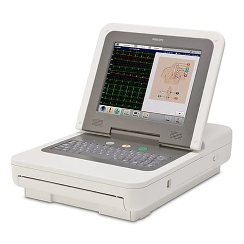 Philips electrocardiogram machine with monitor displaying ECG waveforms and heart rhythm analysis