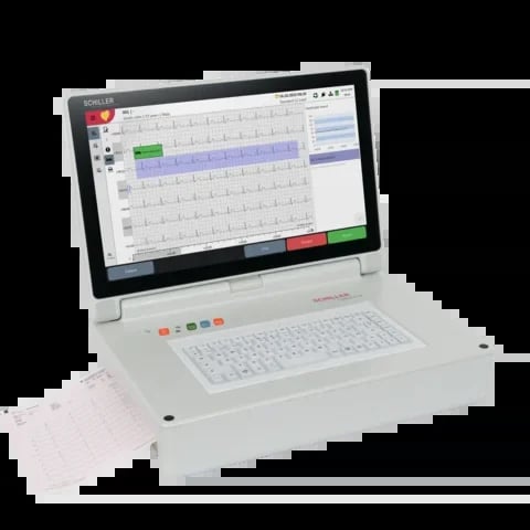 White ECG machine with integrated monitor displaying electrocardiogram waveforms and paper printout