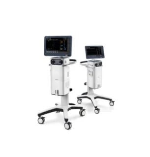 Two white medical ultrasound machines on mobile carts with monitors and control panels