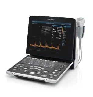 Portable ultrasound machine with touchscreen display showing waveform data and control panel with buttons and dials