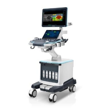 Medical ultrasound machine on wheels with monitor display and control panel showing cardiac and imaging data