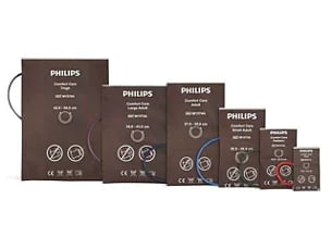 Collection of Philips product boxes arranged in decreasing size from left to right, displaying various electronic devices with control panels and specifications