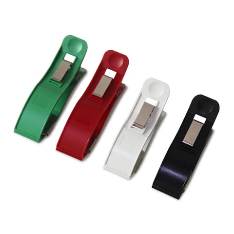 Four colorful tape dispensers in green, red, white, and black arranged in a row